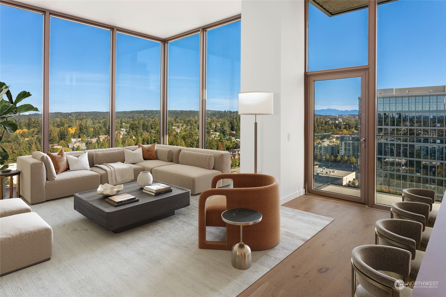 a living room with furniture and a floor to ceiling window