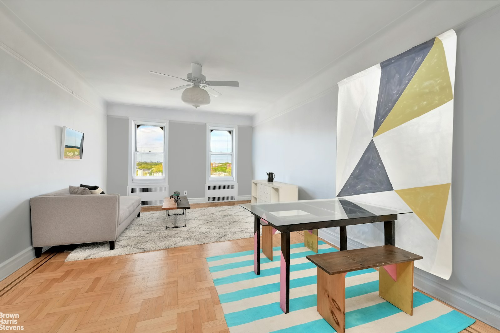 a view of a livingroom with furniture and window