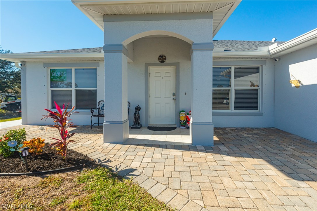 a front view of a house with a patio