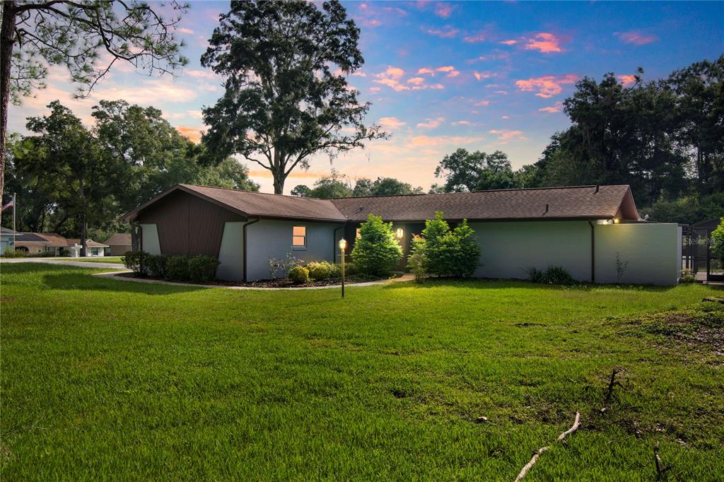 a house view with a garden space