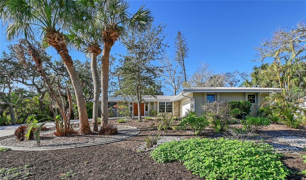 Front Street View - Yard Maintained as Florida Green Landscape.