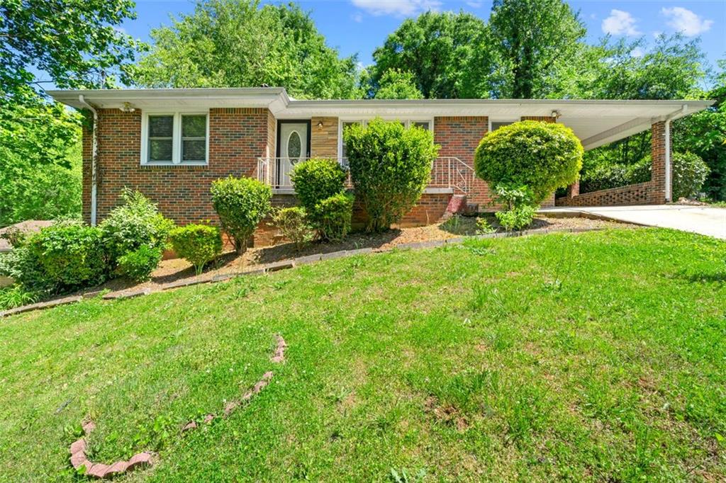 front view of a house with a yard