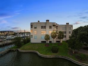 a view of a lake with a big yard