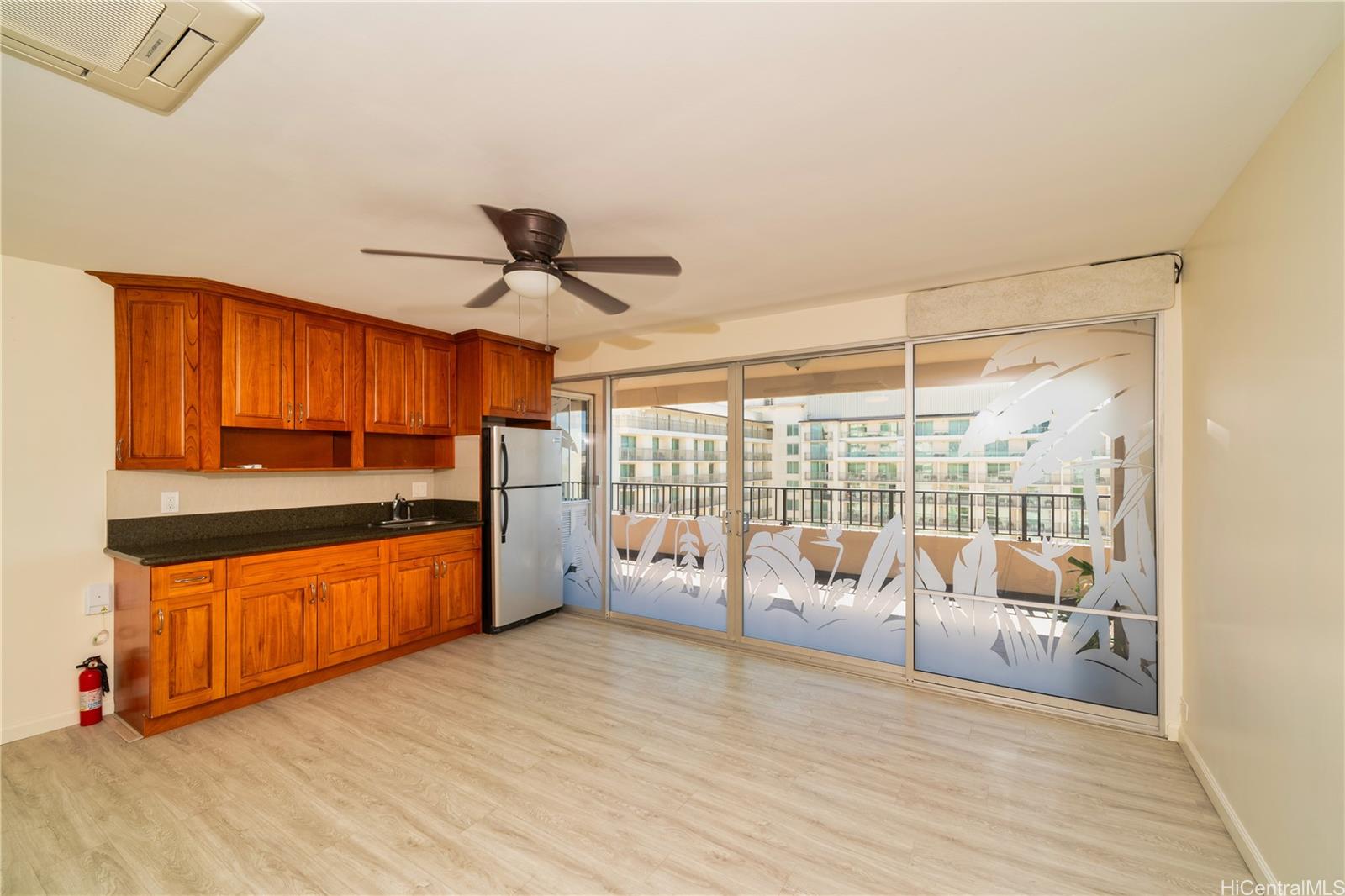 a very nice looking room with a large window and chandelier