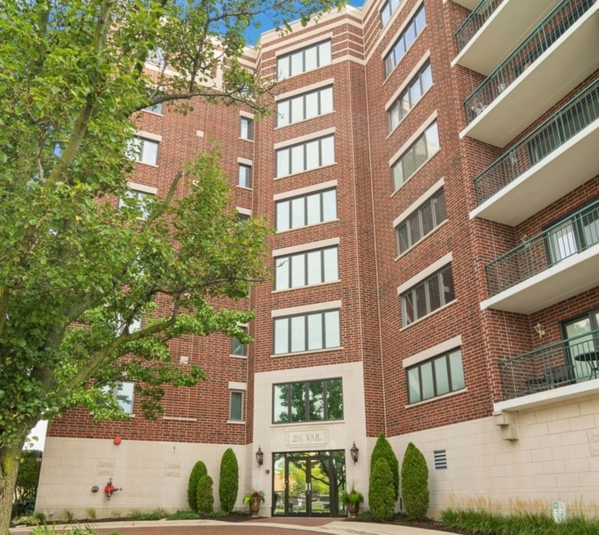 a front view of a multi story residential apartment building