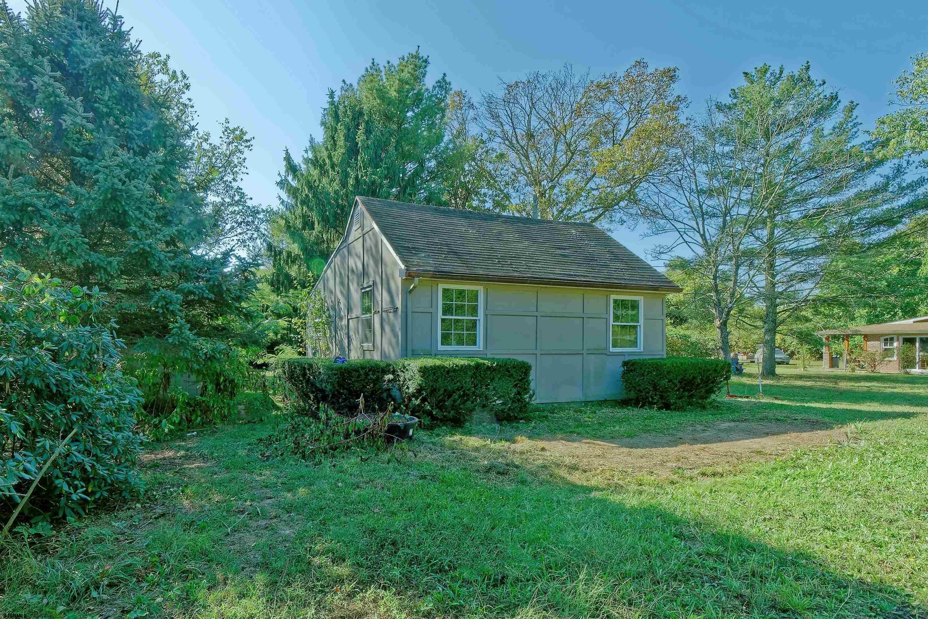 a view of a house with garden