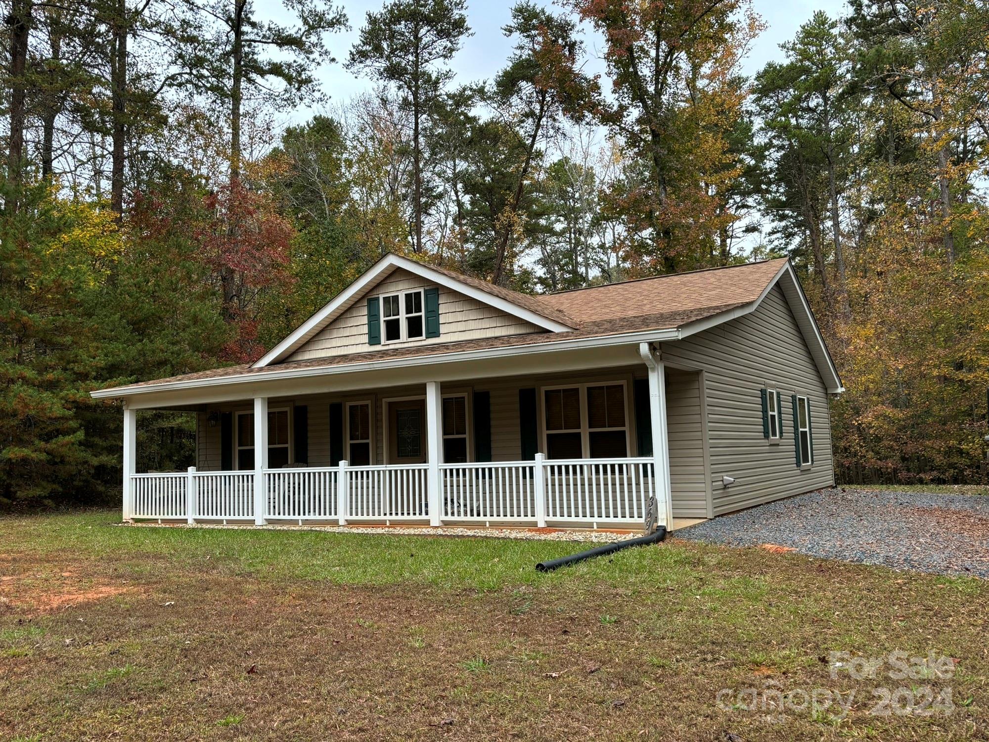 a house with trees in the background