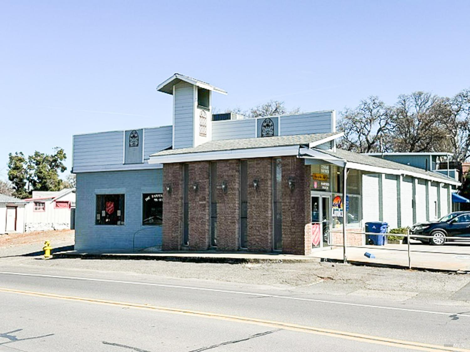 a view of a building with a street