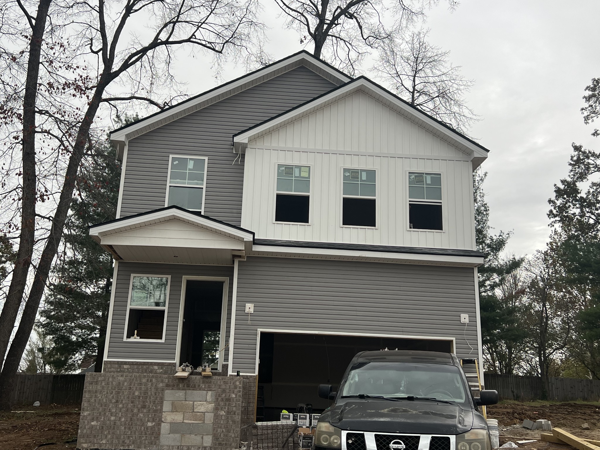 a front view of a house with yard