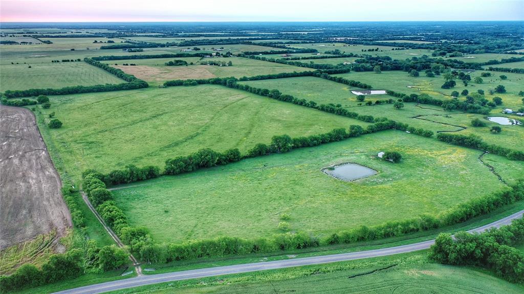 a view of a lush green field