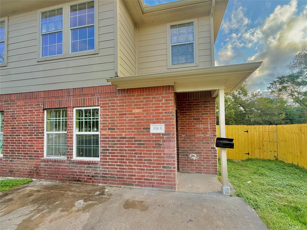 a view of outdoor space and front view of a house