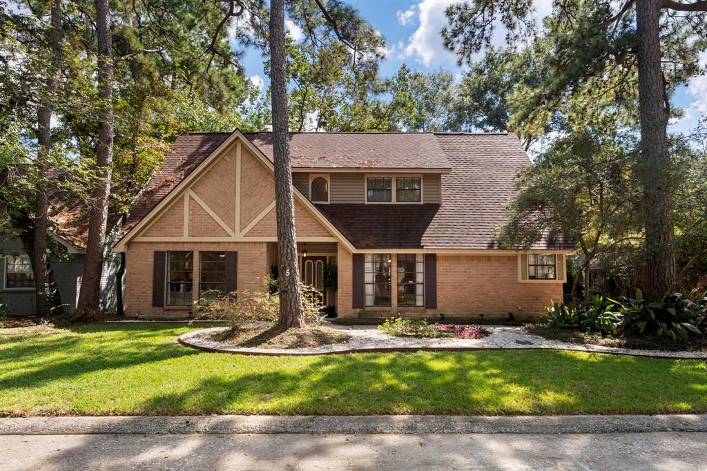 a view of house with yard entertaining space