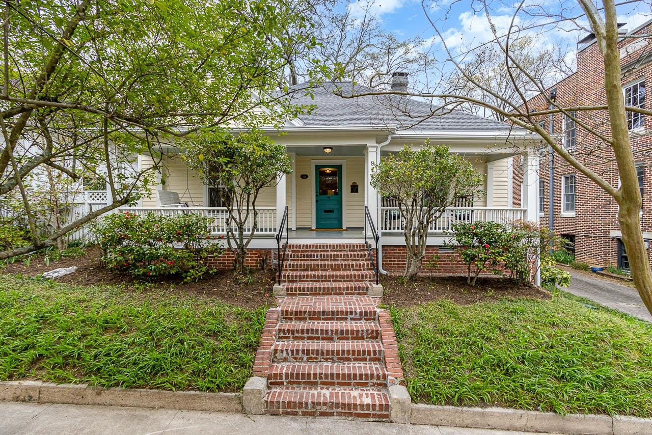 front view of a house with a yard