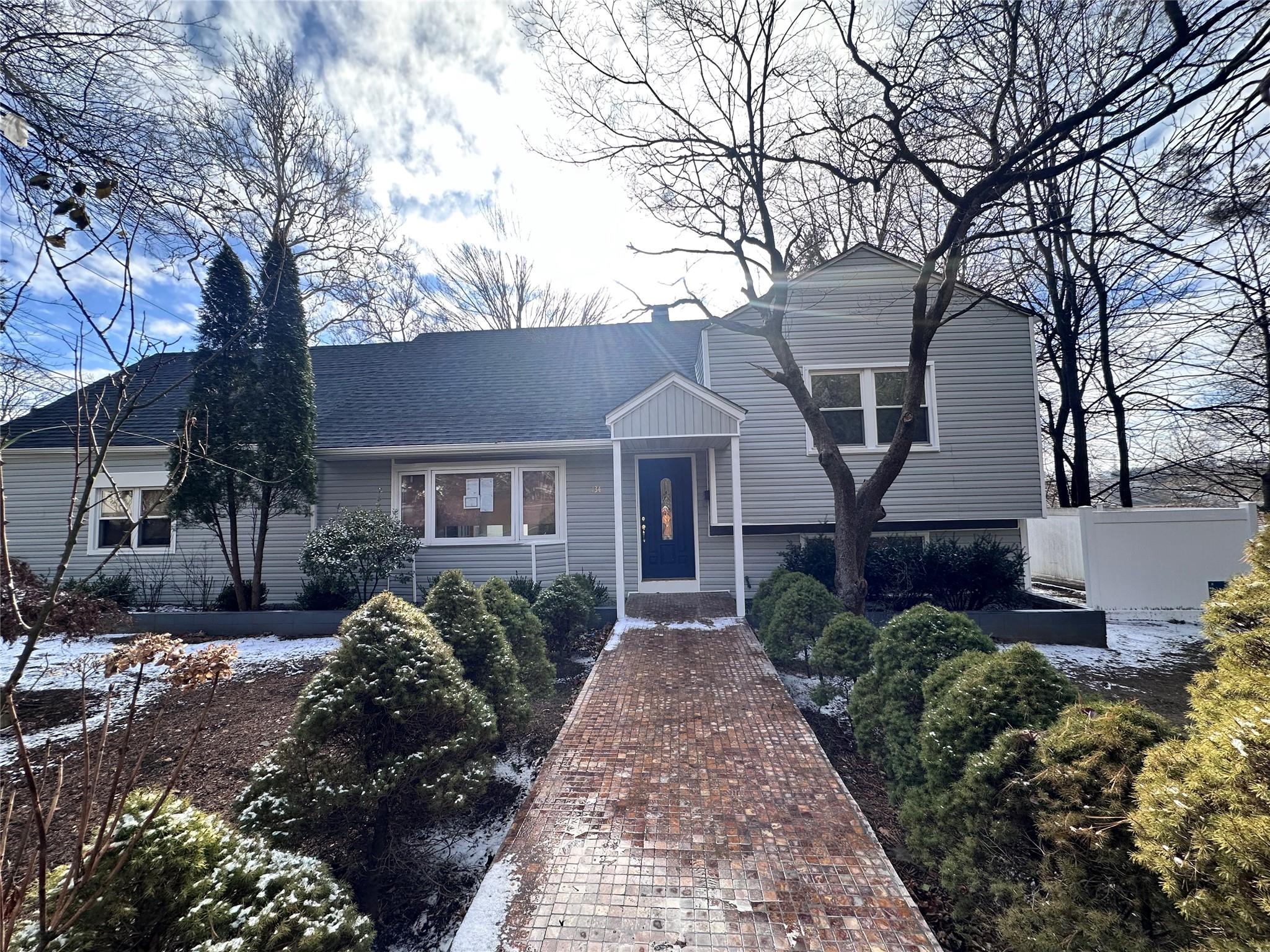 View of split level home