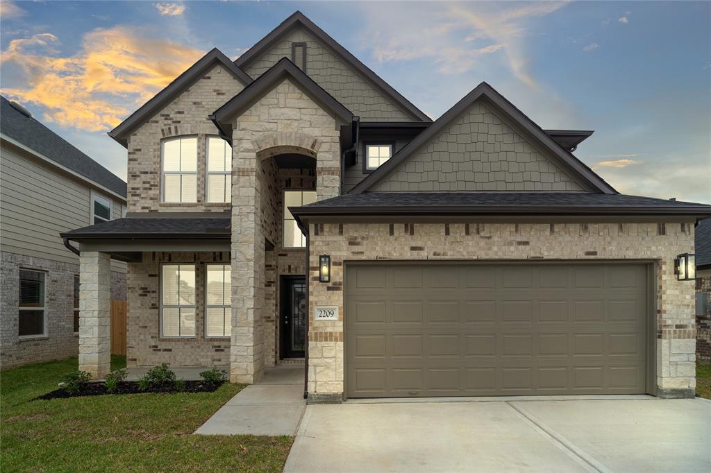 Welcome home to 2209 Forest Chestnut Drive located in the community of Forest Village and zoned to Conroe ISD.