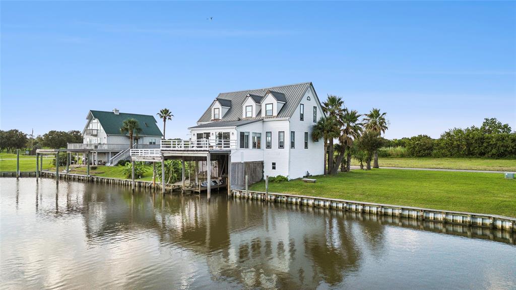 a view of a house with a lake view