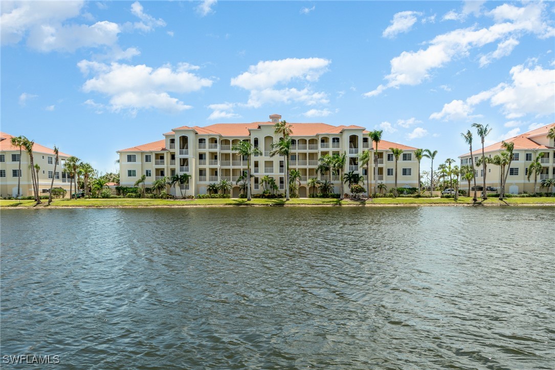 a view of a lake with building