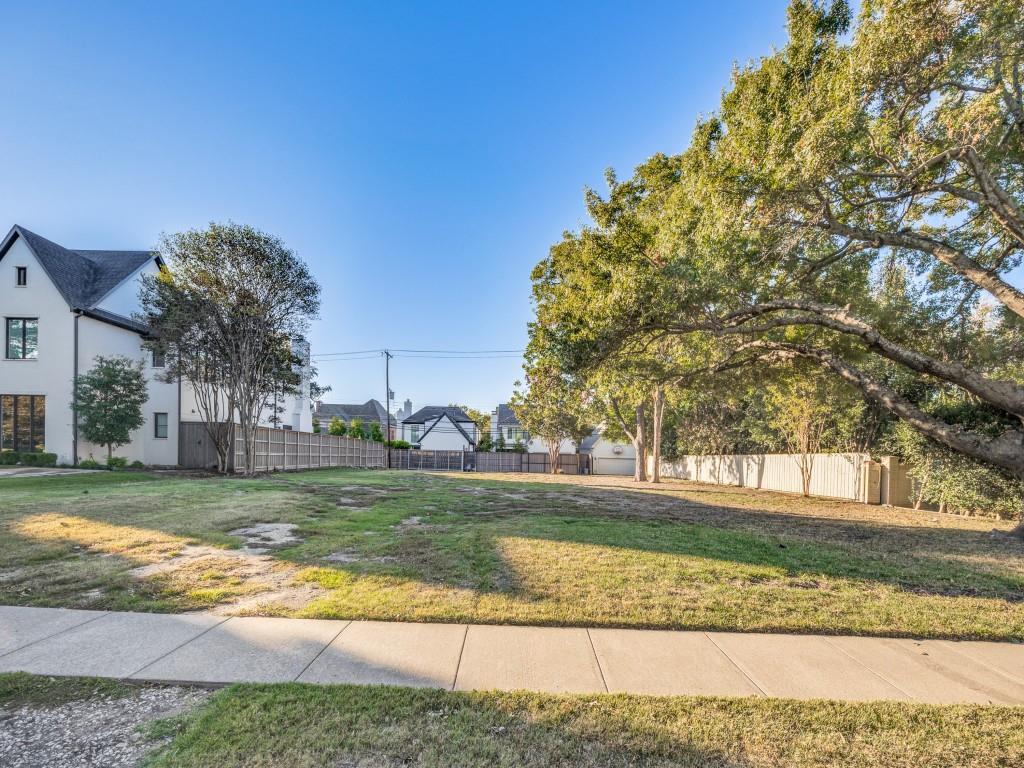 a view of a yard with an outdoor space