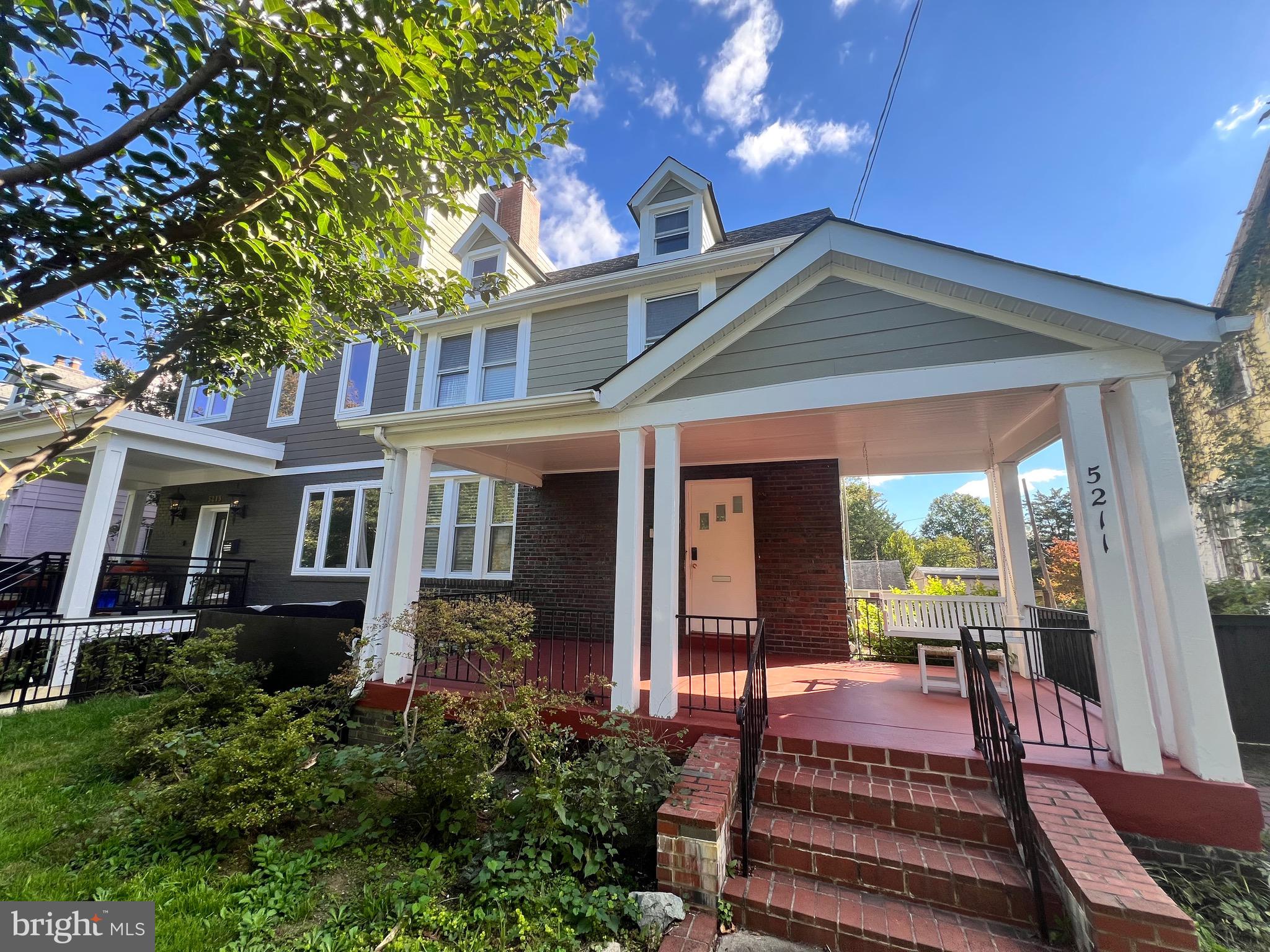 a front view of a house with a porch