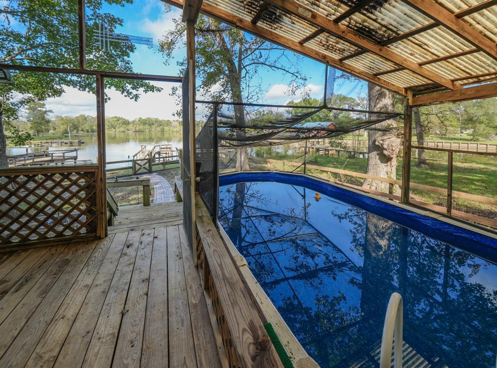 a view of balcony with wooden floor