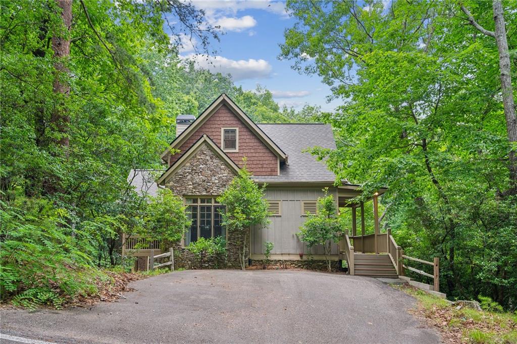 a house with trees in the background