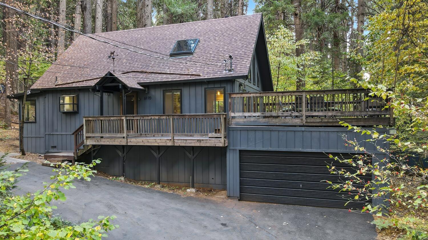 a front view of a house with a garage