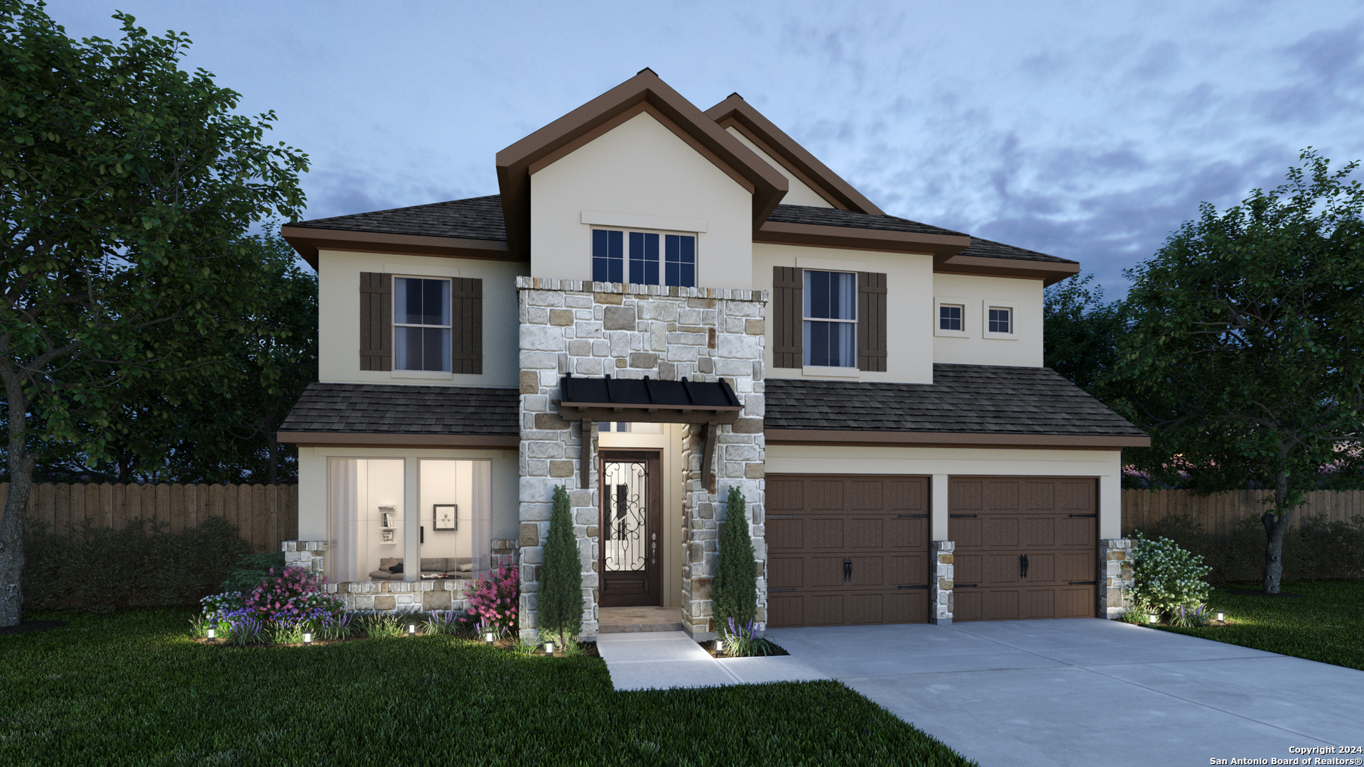 a front view of a house with a garden and yard