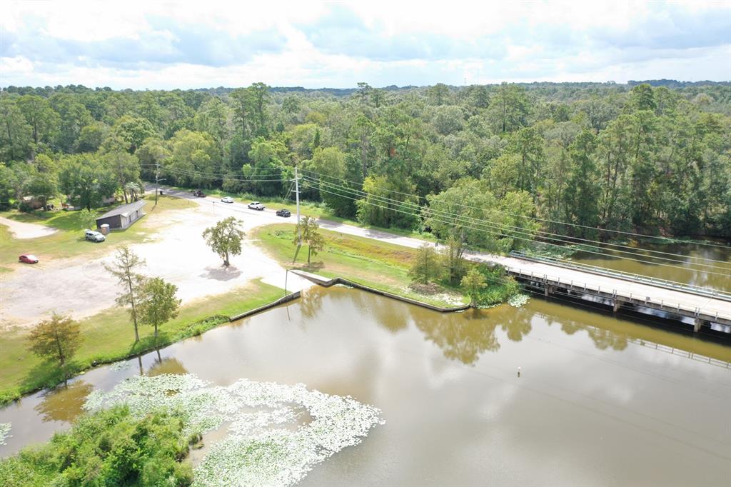 a view of a swimming pool with a yard