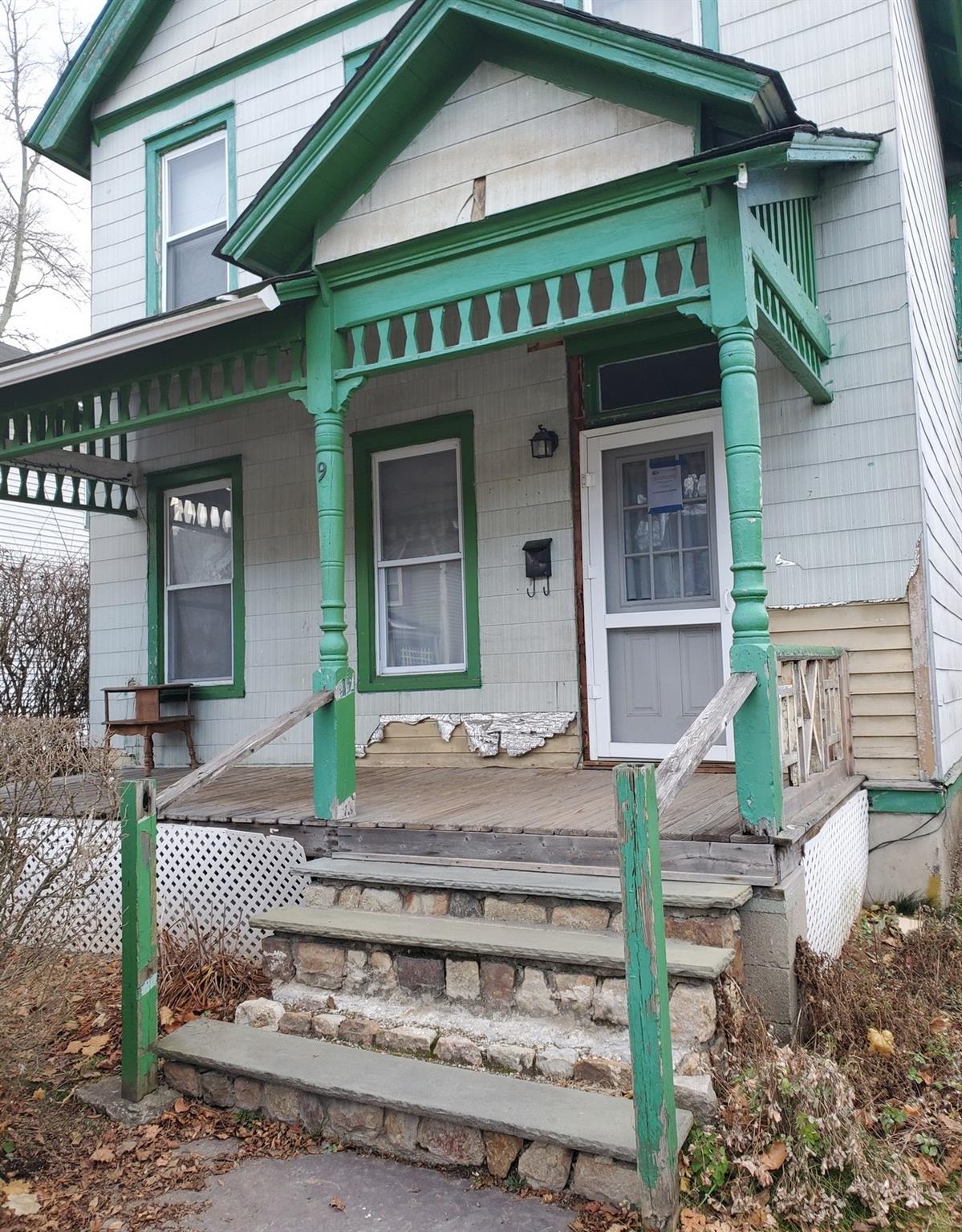 View of front of home featuring covered porch