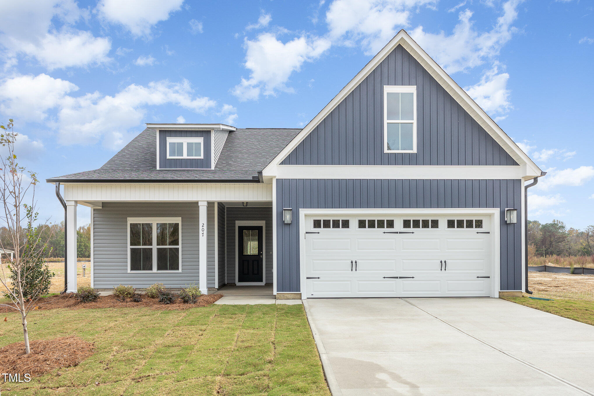 a view of a house with garage