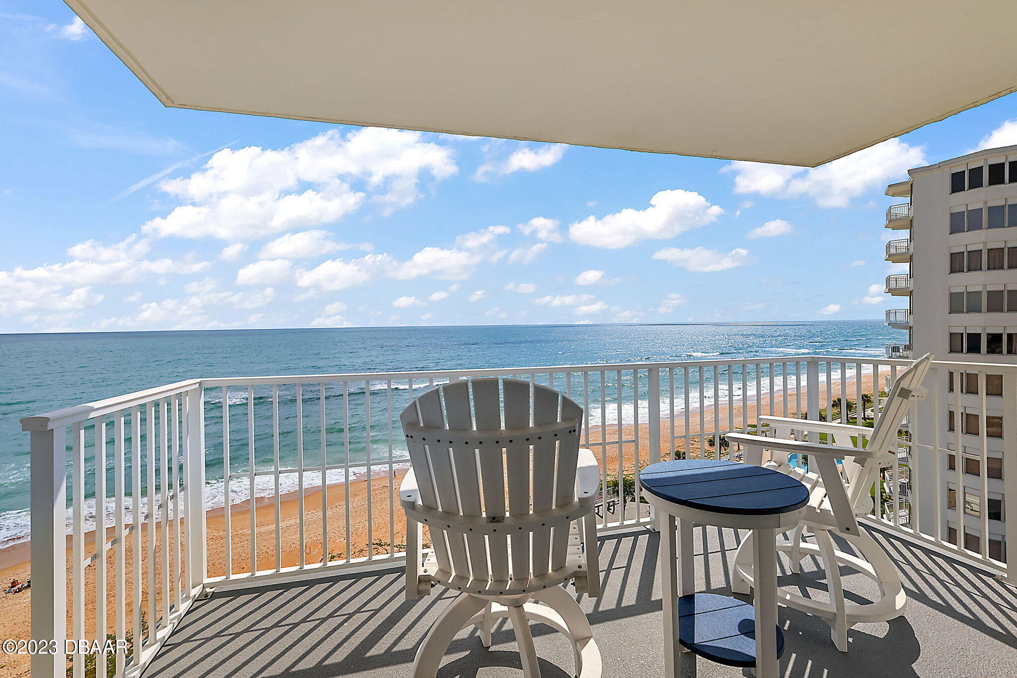 a view of balcony with furniture