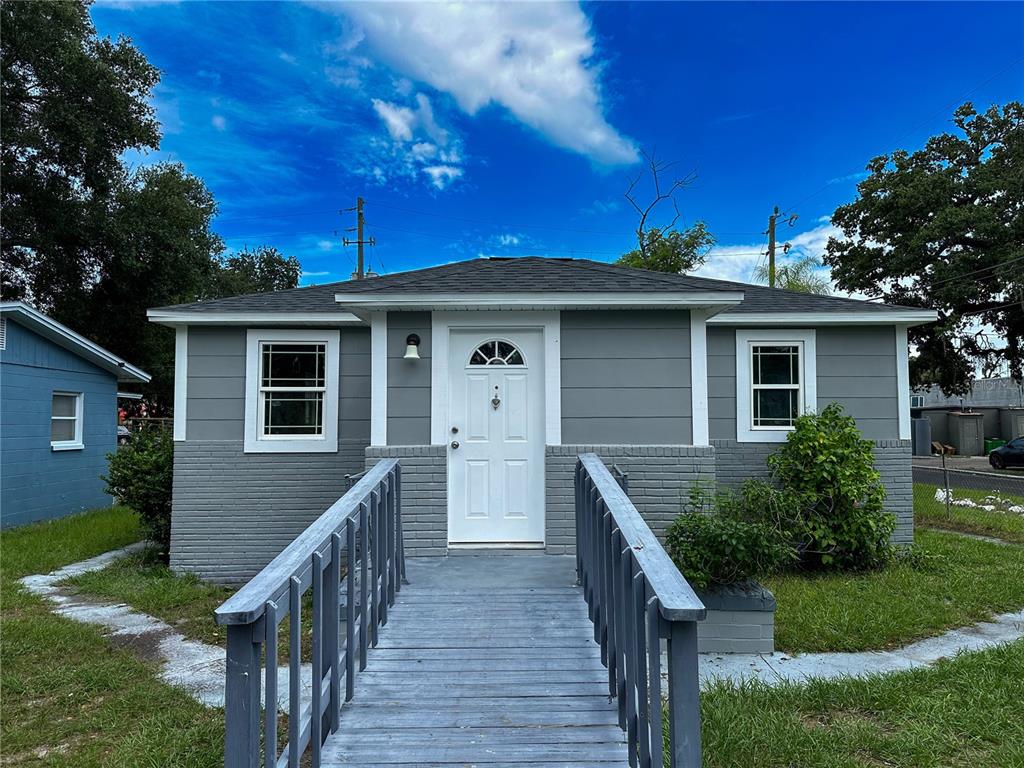 a front view of a house with yard