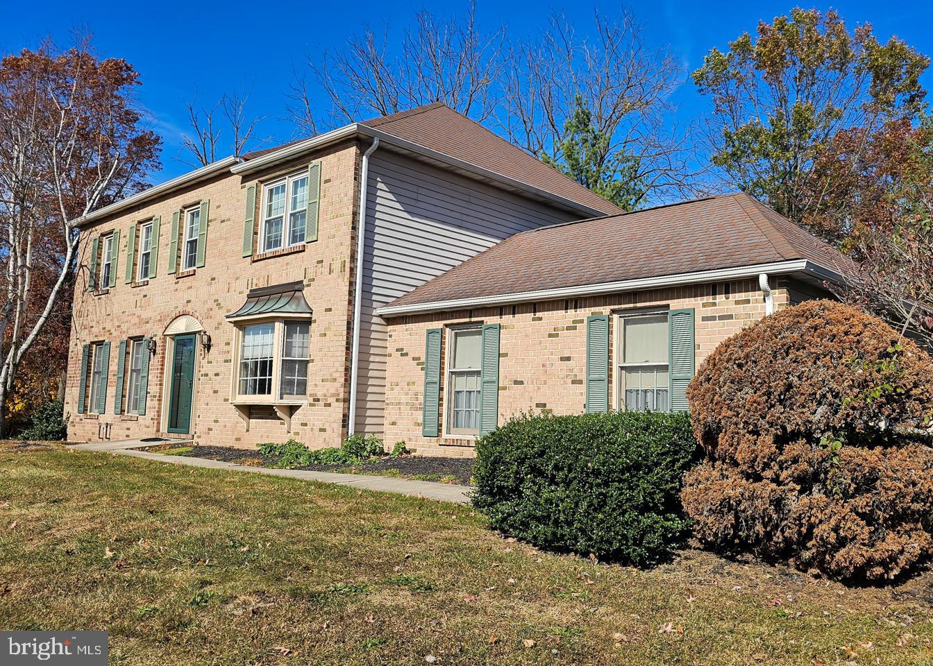 a view of a house with a garden