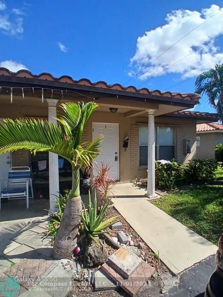 a view of a house with a patio