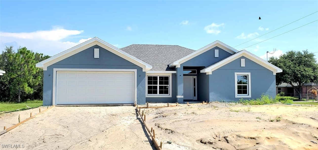 a view of a house with snow on the ground