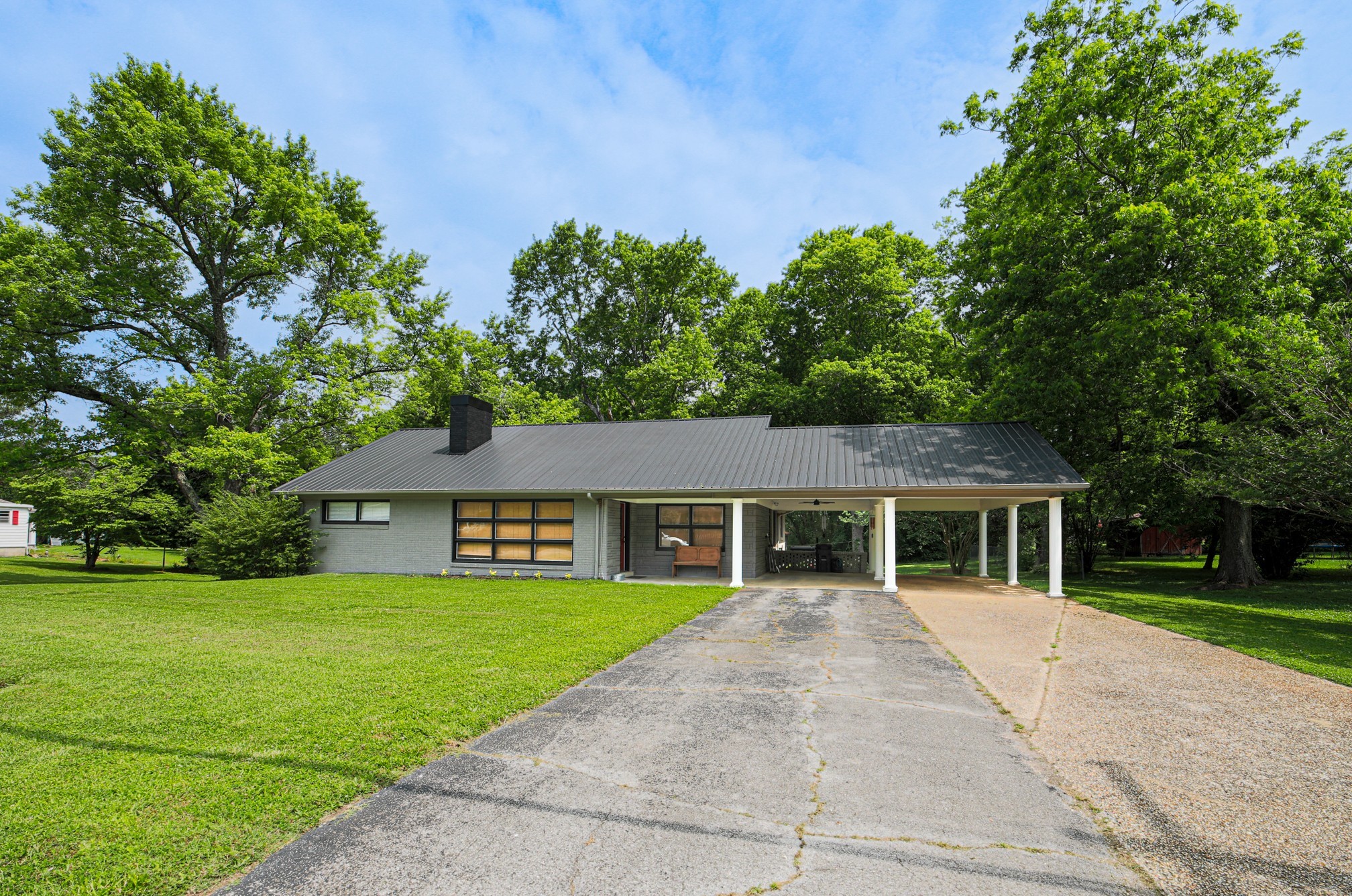 front view of a house with a yard