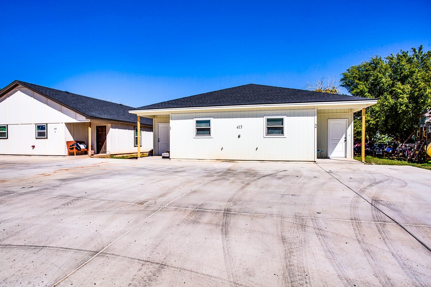 a view of garage and yard