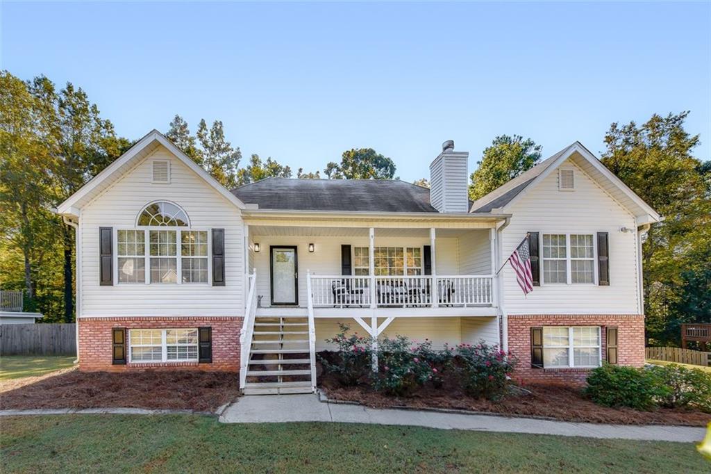 front view of a house with a yard