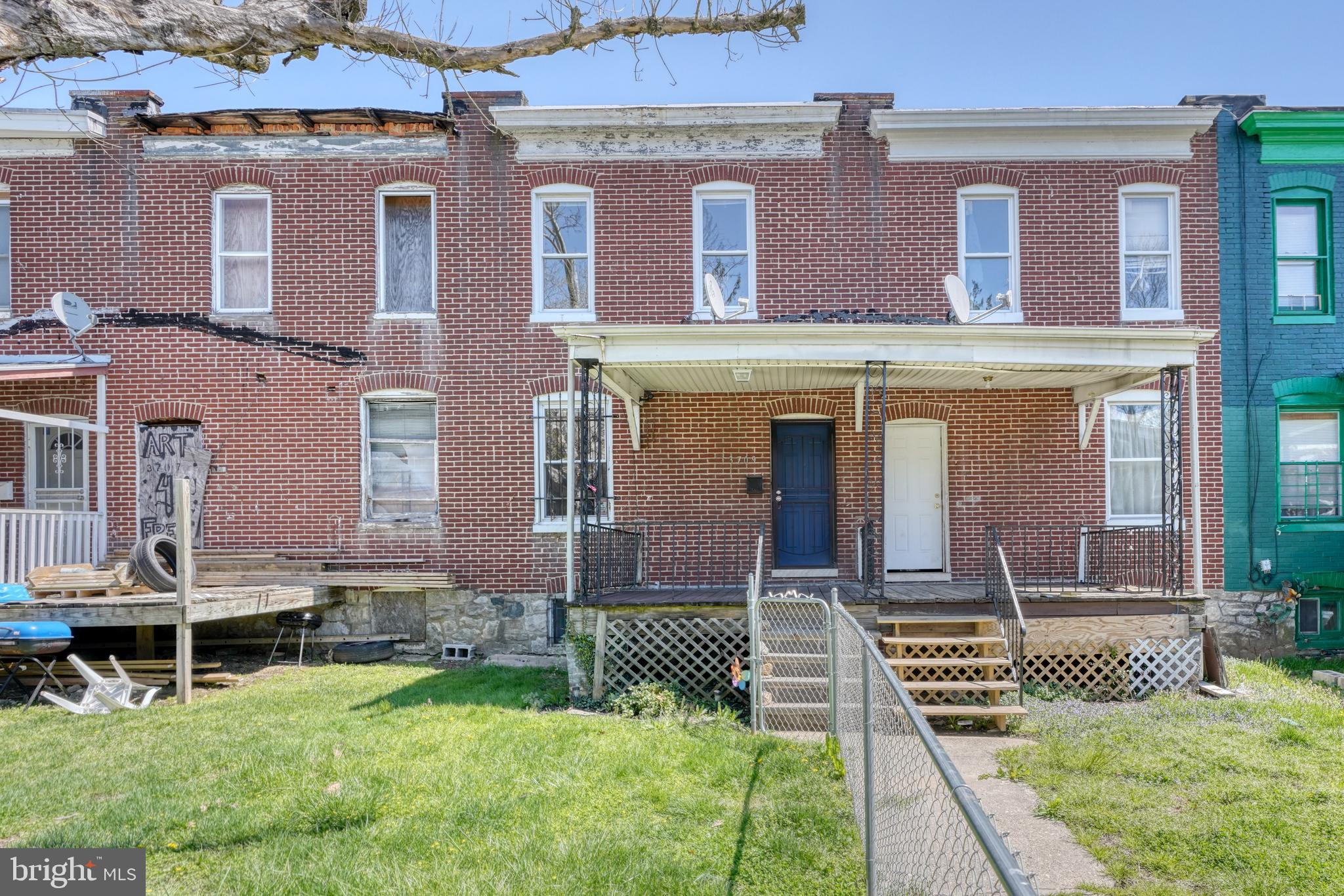 front large house with a yard