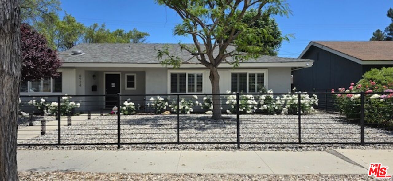 a front view of a house with porch