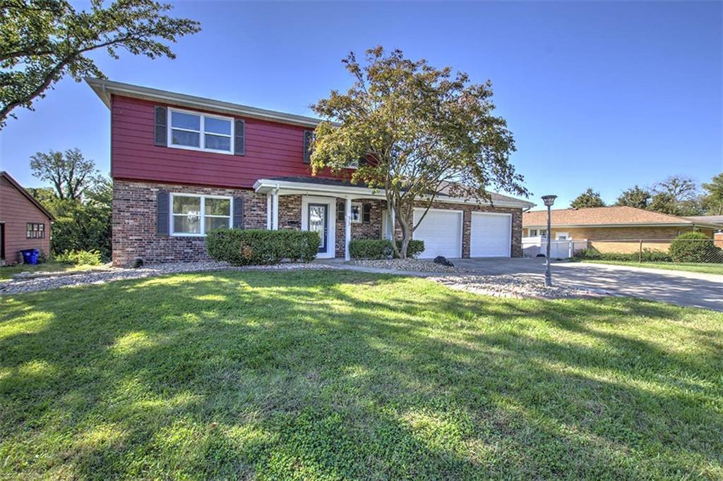 a house view with a garden space