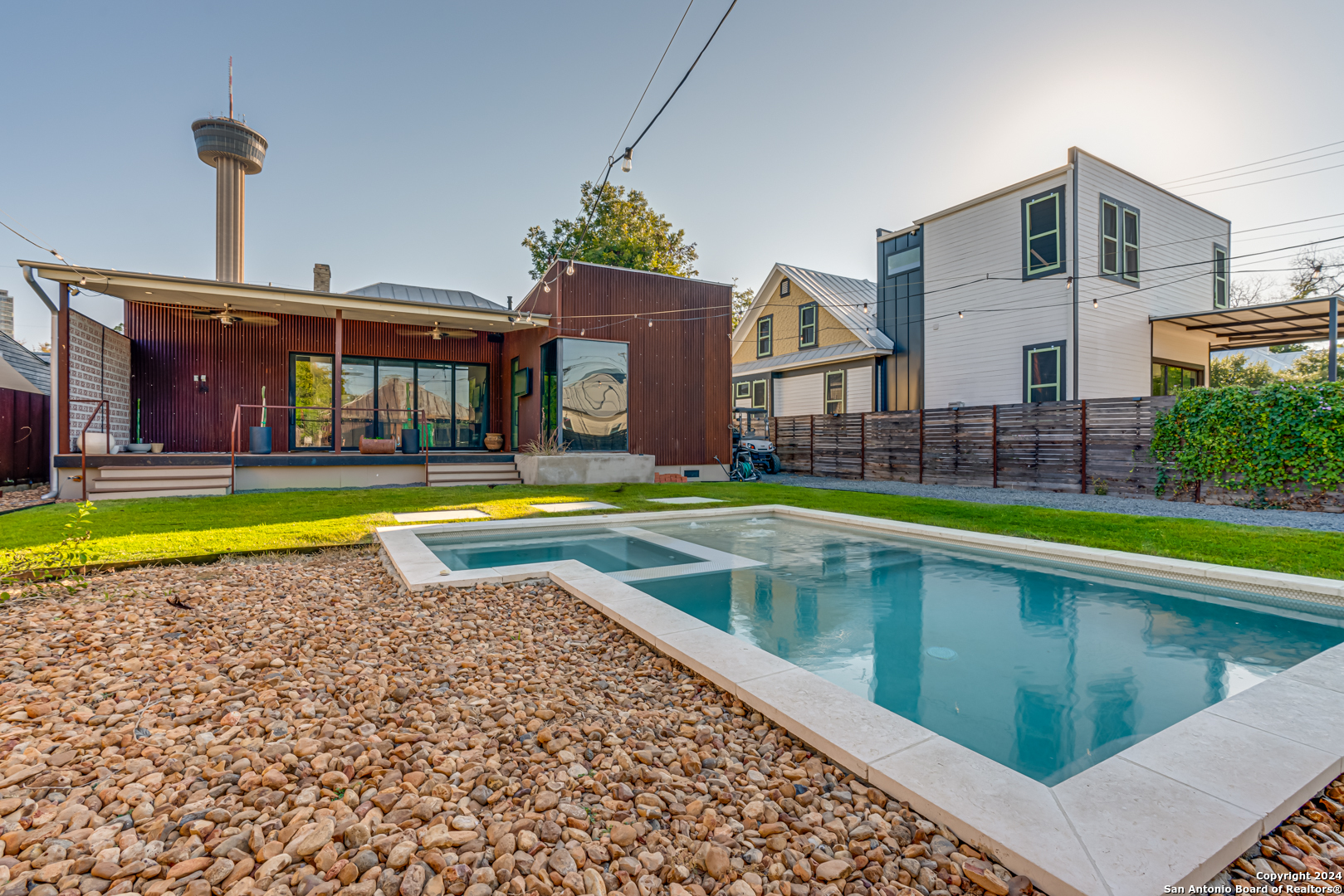 a view of a house with swimming pool