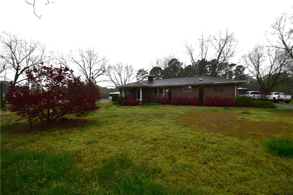 a front view of house with garden