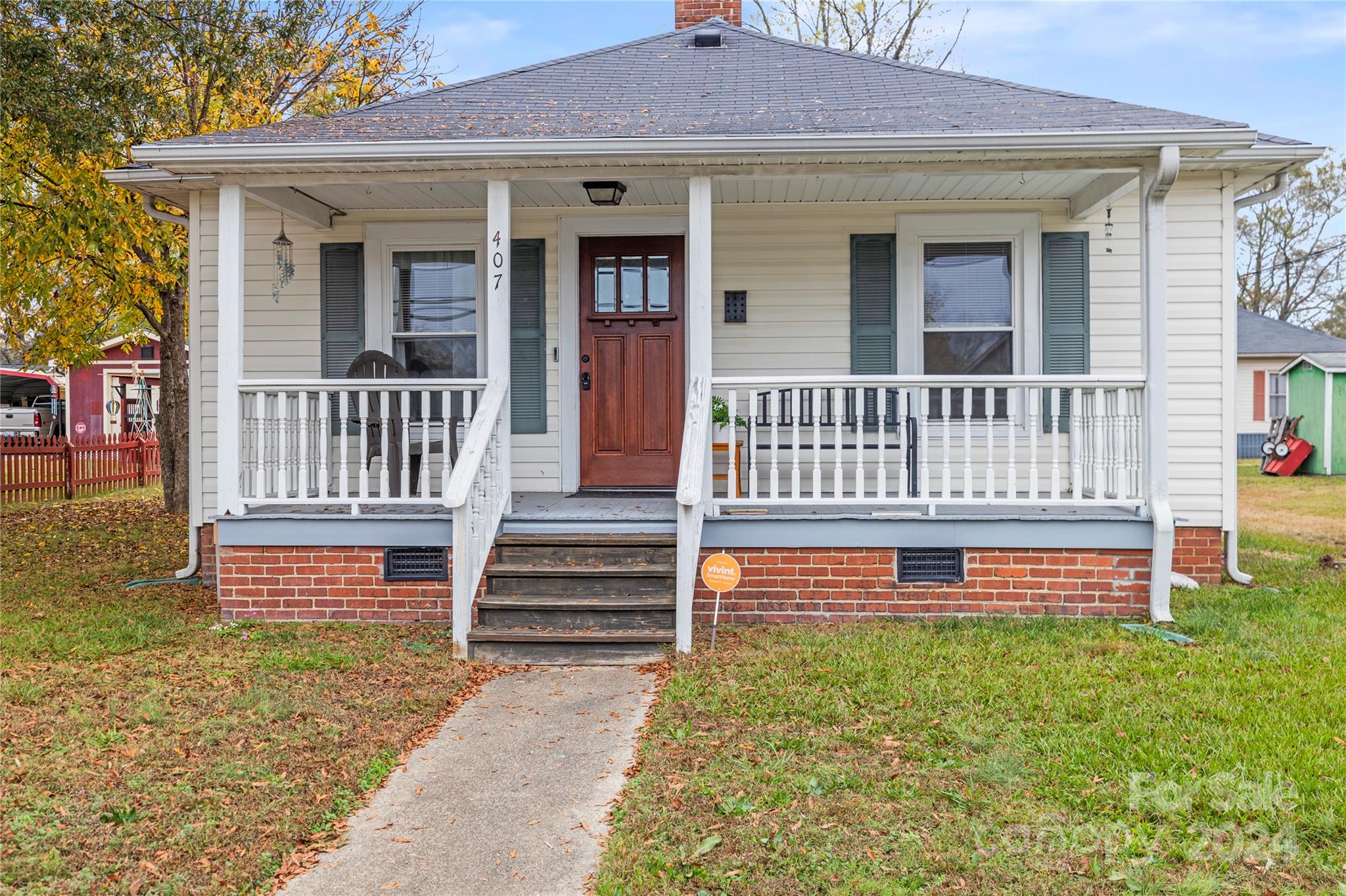 front view of a house with a yard