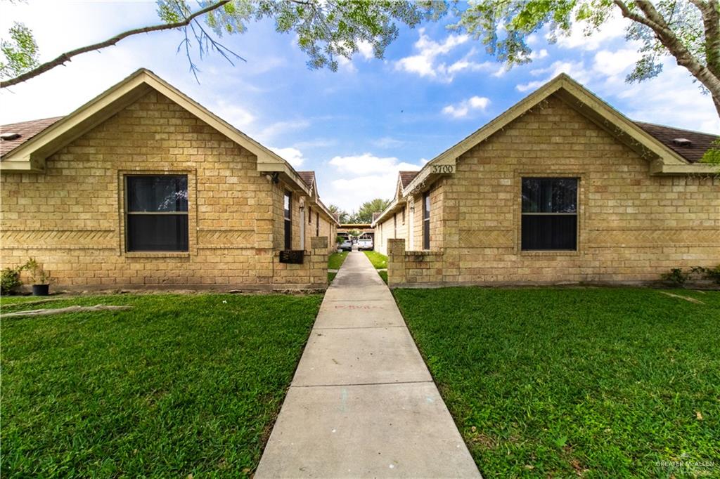 View of front of home featuring a front lawn