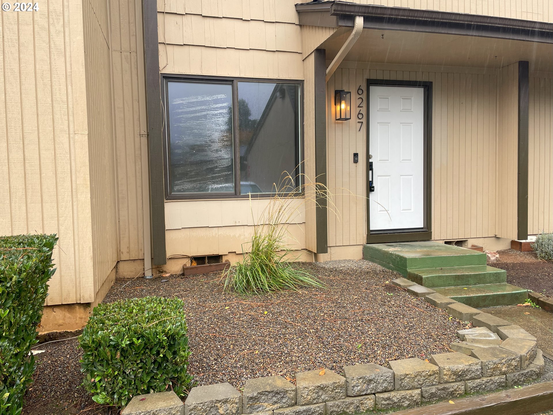 a view of a back yard of the house