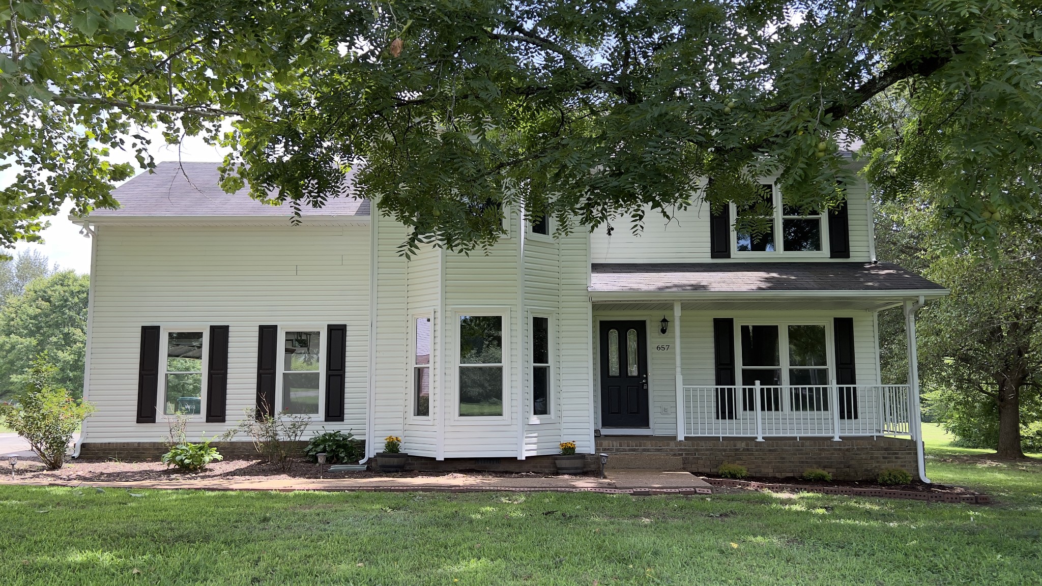 a front view of house with yard