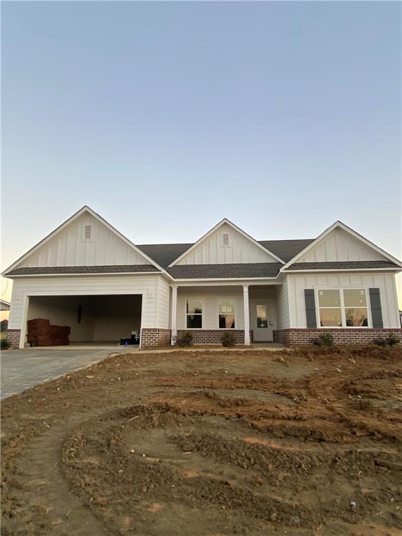 a front view of a house with yard