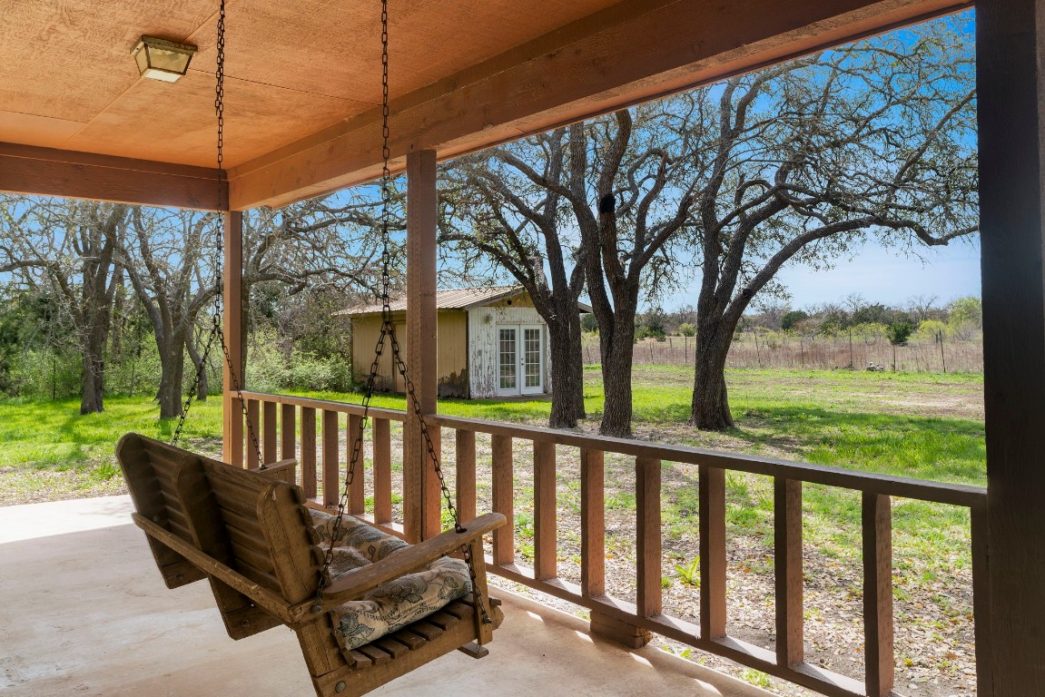 a view of a two chairs in the deck