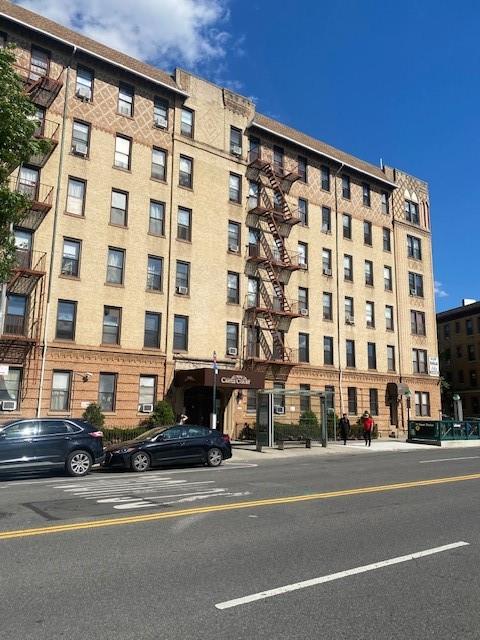 a view of a building and a street